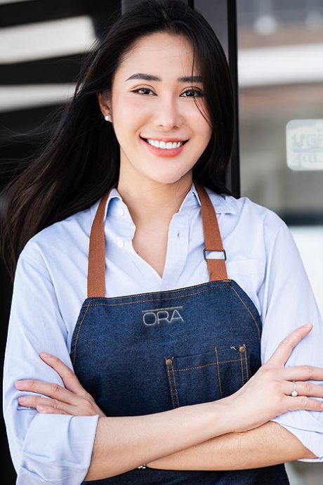 image of smiling server at Ora Restaurant